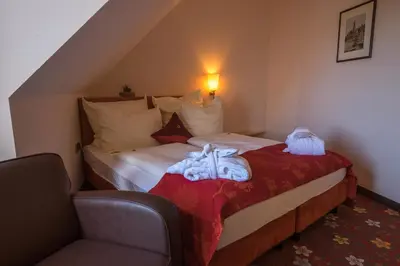 Ein Bett oder Betten in einem Zimmer der Unterkunft Walpurgishof