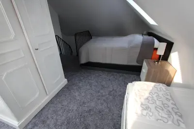 Ein Bett oder Betten in einem Zimmer der Unterkunft Ferienresidenz Jägerstieg / FeWo Kruse