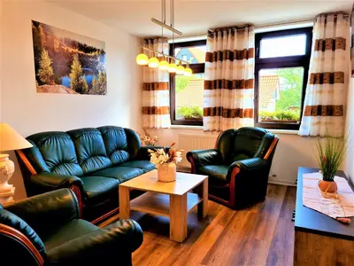 Ein Sitzbereich in der Unterkunft Ferienhaus Heider