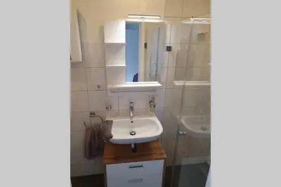 Ein Badezimmer in der Unterkunft Ehem. Berg Apotheke