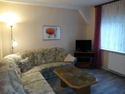 Ein Sitzbereich in der Unterkunft Apartments Carmen