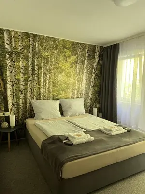 Ein Bett oder Betten in einem Zimmer der Unterkunft Pension Villa Pangea