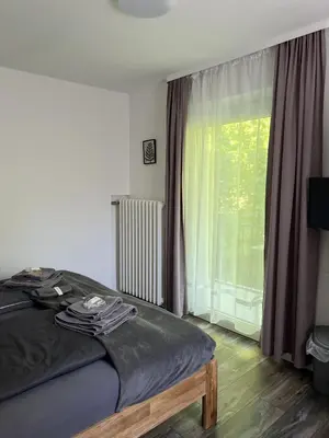 Ein Bett oder Betten in einem Zimmer der Unterkunft Pension Villa Pangea