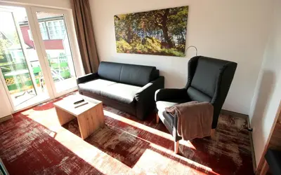 Ein Sitzbereich in der Unterkunft Wellness & Ayurveda Hotel Am Eichenberg
