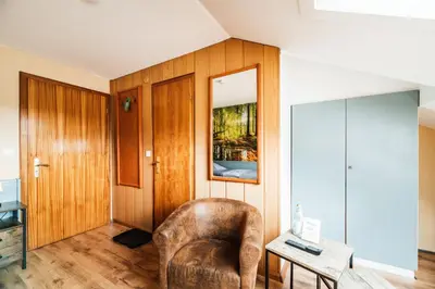 Ein Sitzbereich in der Unterkunft Landhotel Alte Aue
