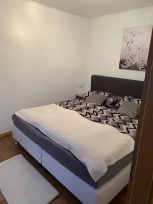 Ein Bett oder Betten in einem Zimmer der Unterkunft Ferienwohnung Römmer
