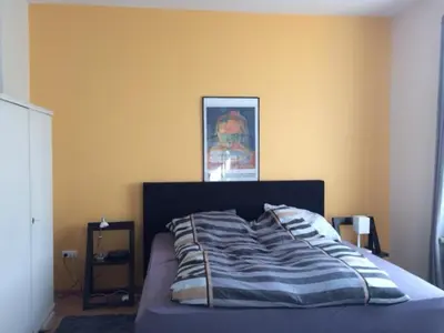Ein Bett oder Betten in einem Zimmer der Unterkunft Ferienwohnung Schützen-Sterne