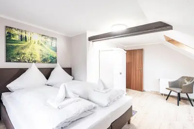 Ein Bett oder Betten in einem Zimmer der Unterkunft Ferienwohnung Ziesing Gernrode