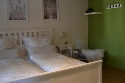 Ein Bett oder Betten in einem Zimmer der Unterkunft Ferienhaus 7. Kaiser