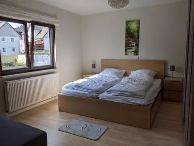 Ein Bett oder Betten in einem Zimmer der Unterkunft Zur ForsHütte