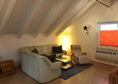 Ein Sitzbereich in der Unterkunft Ferienhaus Enno