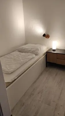 Ein Bett oder Betten in einem Zimmer der Unterkunft Harz Stube