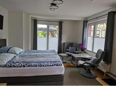 Ein Bett oder Betten in einem Zimmer der Unterkunft 1 Raum Ferienwohnung für Eisenbahnfreunde