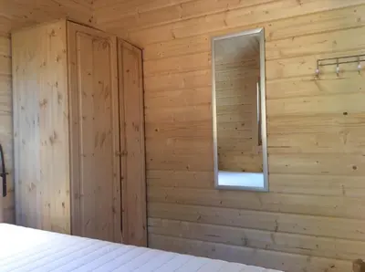 Ein Bett oder Betten in einem Zimmer der Unterkunft Blockhaus Harzblick4C