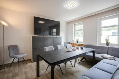 Ein Sitzbereich in der Unterkunft Ferienhaus an der Brockenbahn