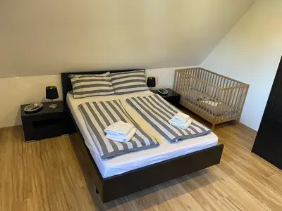 Ein Bett oder Betten in einem Zimmer der Unterkunft Ferienwohnung Arnold