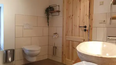 Ein Badezimmer in der Unterkunft Ferienhaus Tor zum Münzenberg