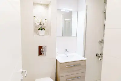 Ein Badezimmer in der Unterkunft Haus am See Luxury HS 228 B
