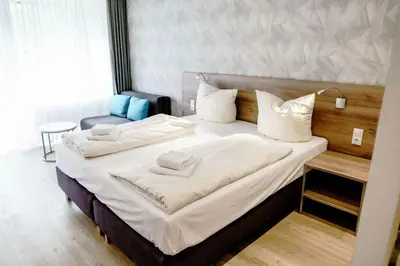 Ein Bett oder Betten in einem Zimmer der Unterkunft Haus am See Luxury HS 223 B
