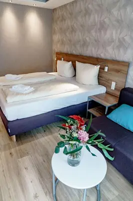 Ein Bett oder Betten in einem Zimmer der Unterkunft Haus am See Luxury HS 226 B
