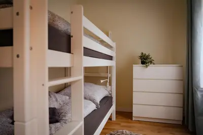 Ein Bett oder Betten in einem Zimmer der Unterkunft Ferienapartments HarzZeit