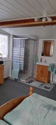 Ein Bett oder Betten in einem Zimmer der Unterkunft Ferienwohnung Haus Niedersachsen