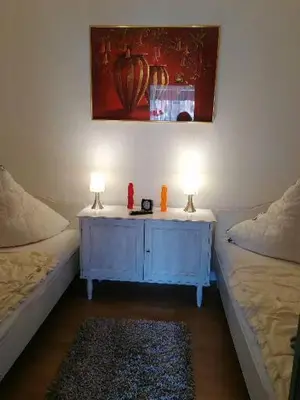 Ein Bett oder Betten in einem Zimmer der Unterkunft CrisAnd 2 Bergen