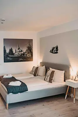 Ein Bett oder Betten in einem Zimmer der Unterkunft Haus am See Harzflair