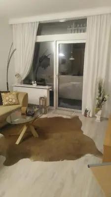 Ein Sitzbereich in der Unterkunft Ferienperle Bad Harzburg mit Schwimmbad und Sauna