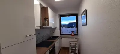 Küche/Küchenzeile in der Unterkunft Ferienwohnung Wiesenblick mit Terrasse im Landhaus Fischer