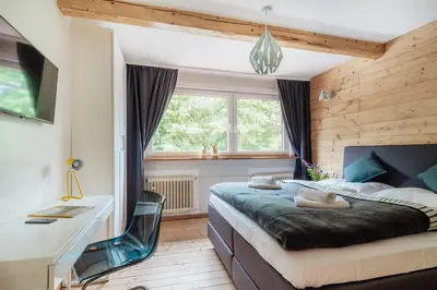 Ein Bett oder Betten in einem Zimmer der Unterkunft Ferienhaus Fingerhut