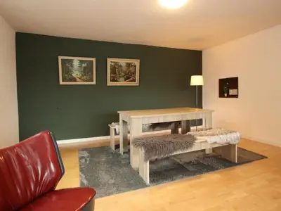 Ein Sitzbereich in der Unterkunft Ferienwohnung mit weitem Ausblick in Altenau