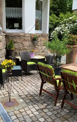 Ein Garten an der Unterkunft Hotel-Pension Teutonia