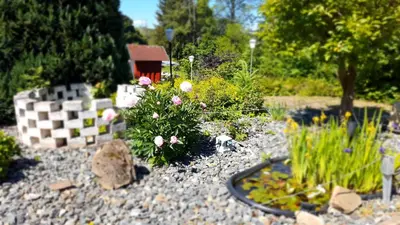 Ein Garten an der Unterkunft Hotel Schneiderhof
