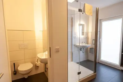Ein Badezimmer in der Unterkunft Ferienhaus Wanderzeit mit Sauna, Garten und Grill