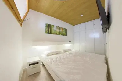 Ein Bett oder Betten in einem Zimmer der Unterkunft Apartment 225