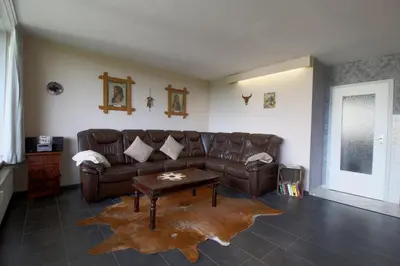 Ein Sitzbereich in der Unterkunft Apartment 260 Cowboy & Indianer