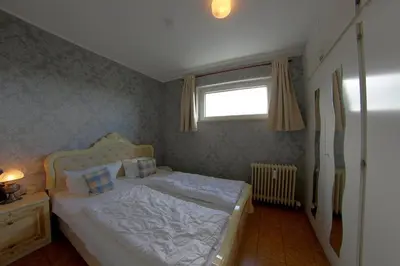Ein Bett oder Betten in einem Zimmer der Unterkunft Apartment 260 Cowboy & Indianer