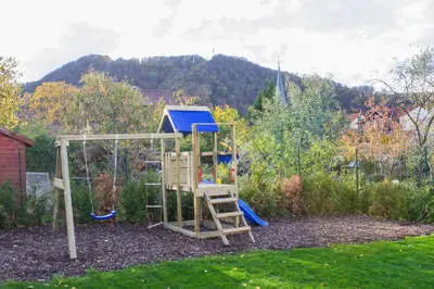 Ein Kinderspielbereich in der Unterkunft Appartements am Bodetal