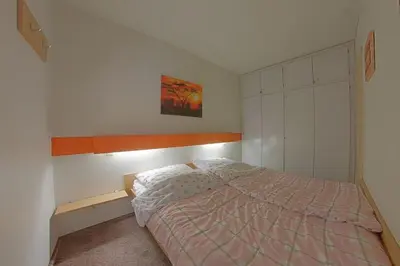 Ein Bett oder Betten in einem Zimmer der Unterkunft Apartment 428