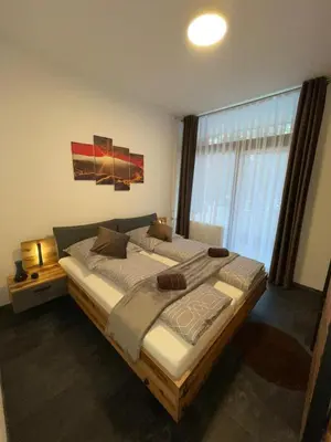 Ein Bett oder Betten in einem Zimmer der Unterkunft Mariposa 4 incl Pool & Sauna