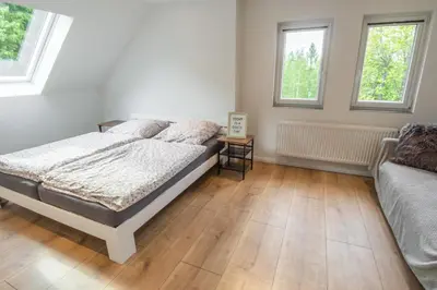 Ein Bett oder Betten in einem Zimmer der Unterkunft Bett im Bahnhof Waldblick