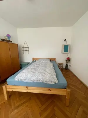 Ein Bett oder Betten in einem Zimmer der Unterkunft Ferienwohnung für 2 Gäste