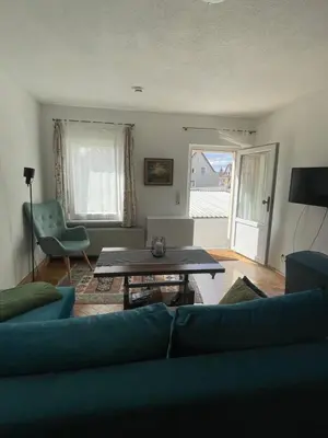 Ein Sitzbereich in der Unterkunft Ferienwohnung für 2 Gäste