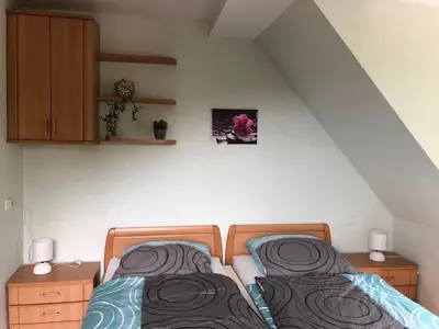 Ein Bett oder Betten in einem Zimmer der Unterkunft Alpaka Haus Sanssouci Tanne Oberharz