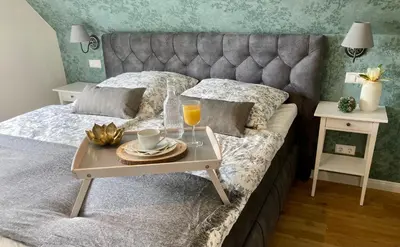 Ein Bett oder Betten in einem Zimmer der Unterkunft Traumhaus Thale mit Sauna und Kamin
