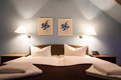 Ein Bett oder Betten in einem Zimmer der Unterkunft Ulrichshof
