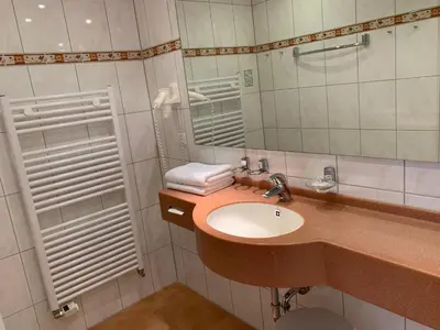 Ein Badezimmer in der Unterkunft Hotel Haus am Hochwald