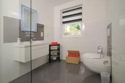 Ein Badezimmer in der Unterkunft Designlofts Über der Stadt - Sennhütte 15