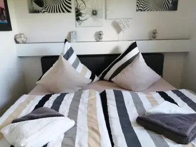 Ein Bett oder Betten in einem Zimmer der Unterkunft App 420 mit Schwimmbad und Sauna im Panoramic Hohegeiß Braunlage